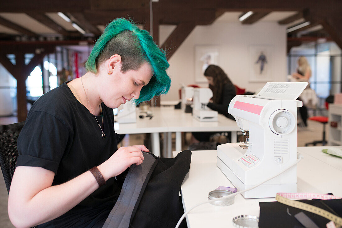 Woman working at textile workshop