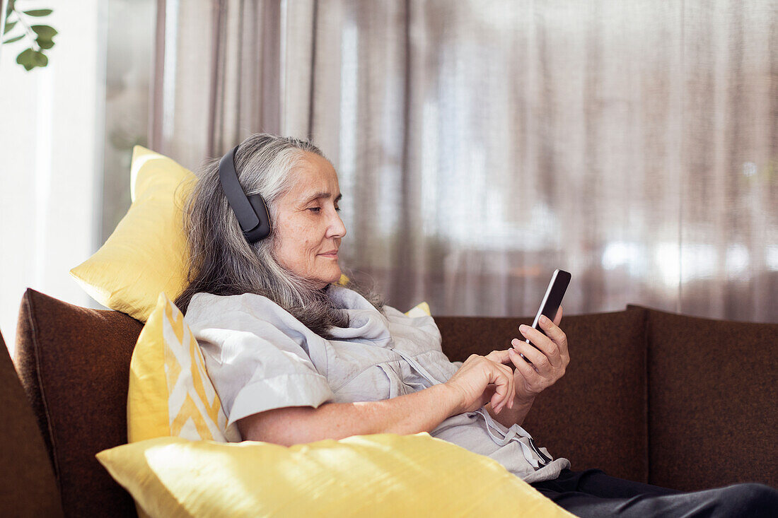 Mature woman using cell phone