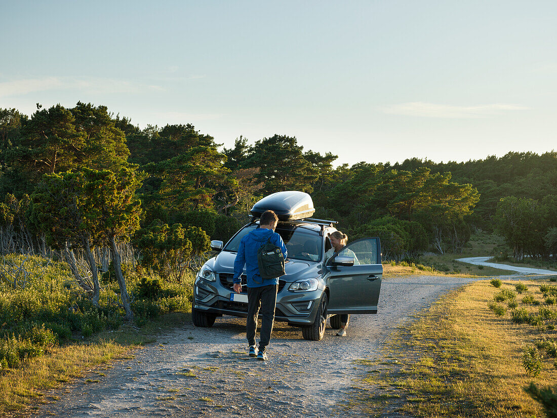 Couple near car