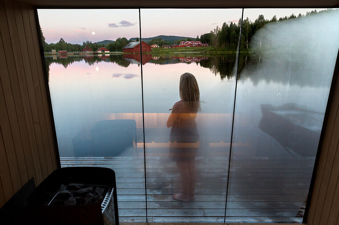 Girl seen through steamed glass