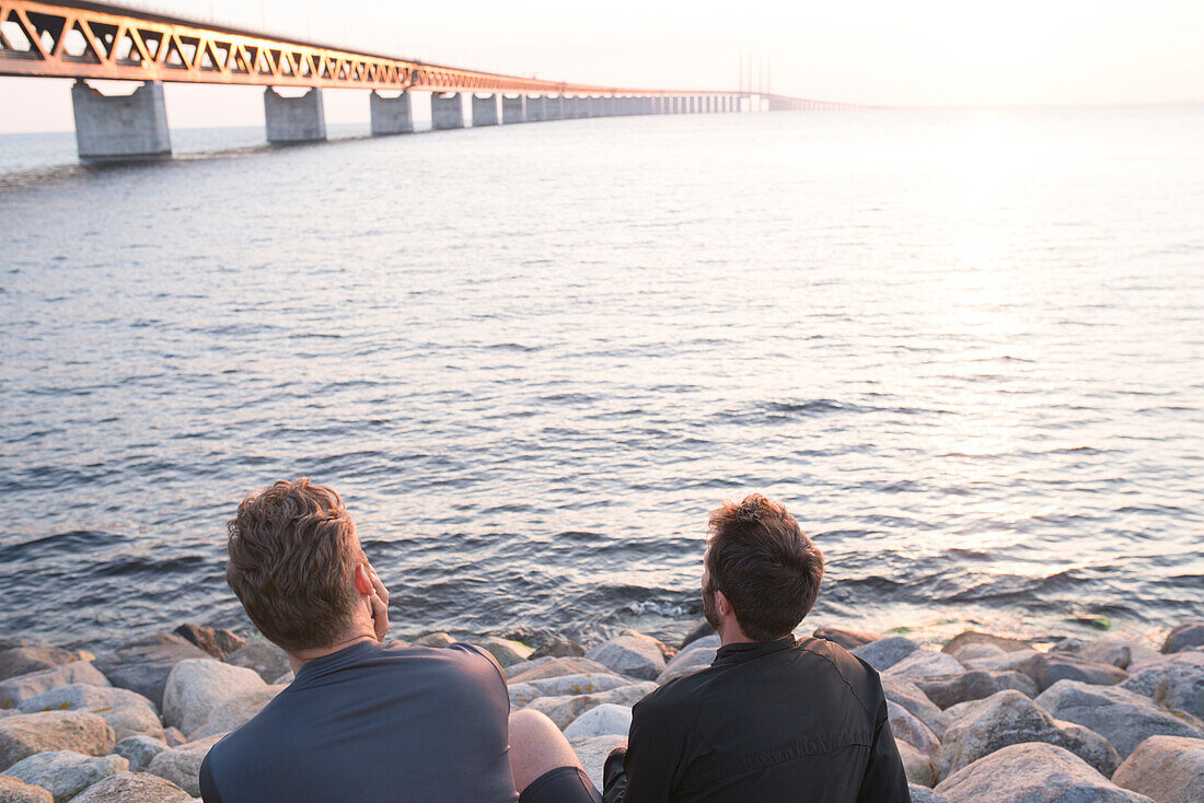 Men looking at sea