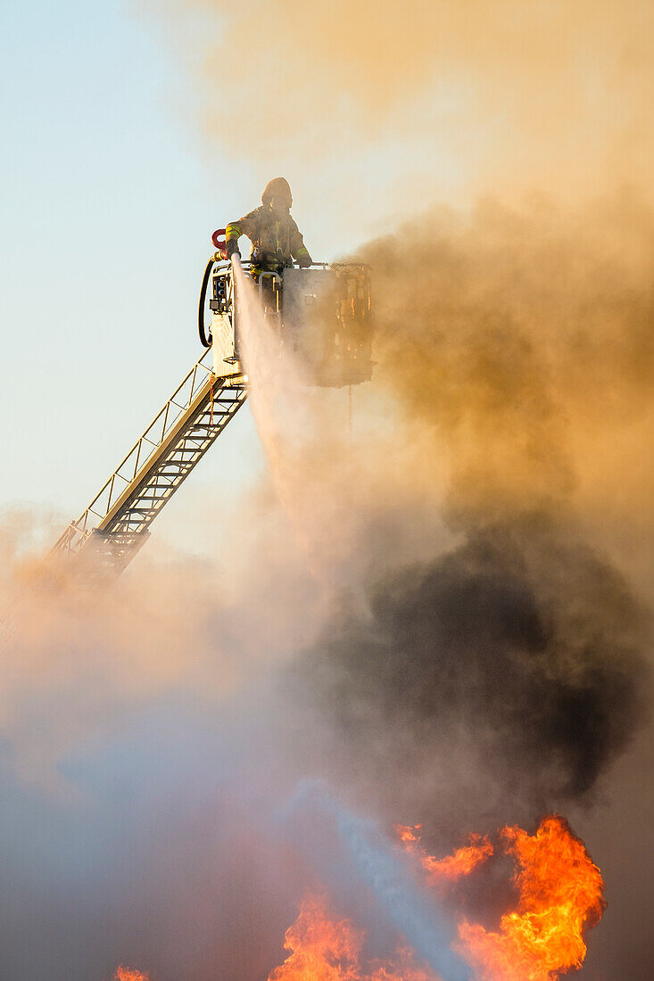 Firefighter fighting fire