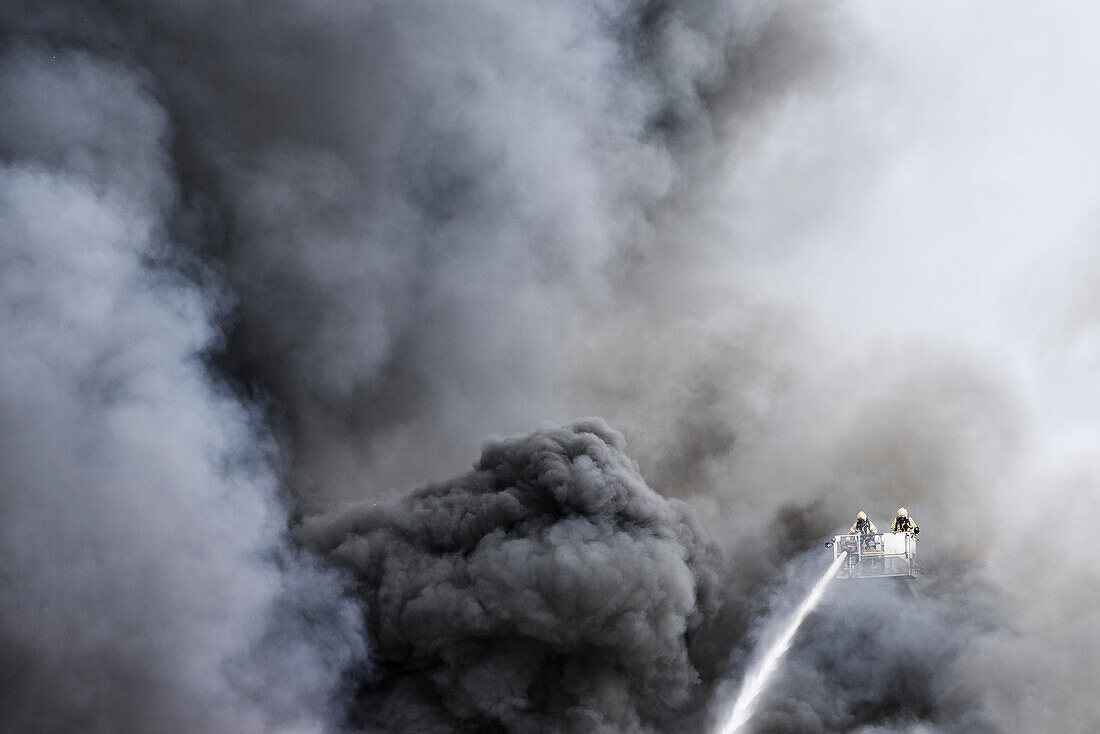 Firefighters fighting fire