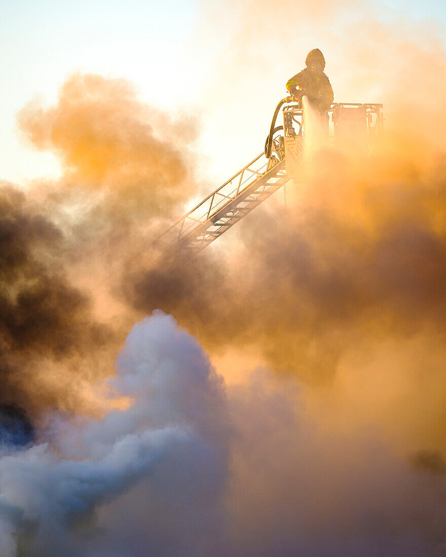 Firefighter fighting fire