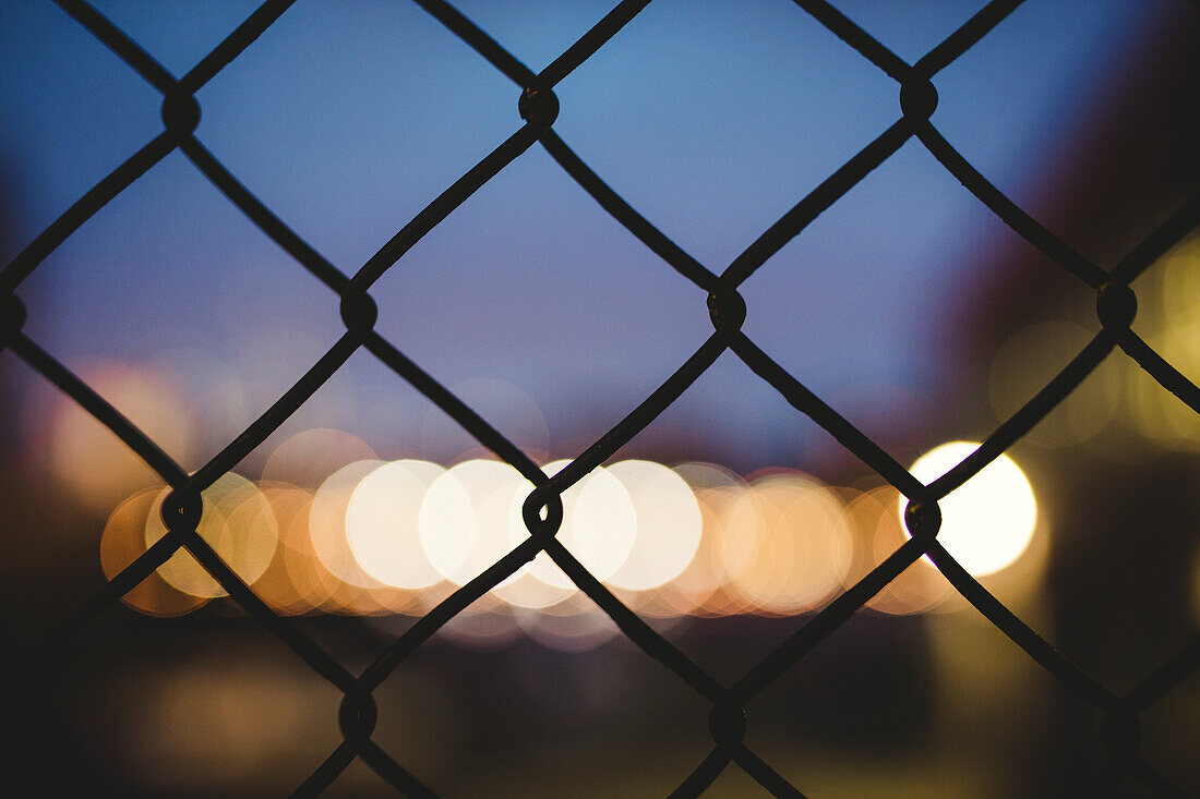 Chainlink fence at night