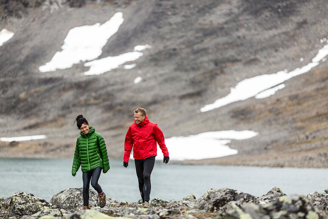 Couple running in mountains