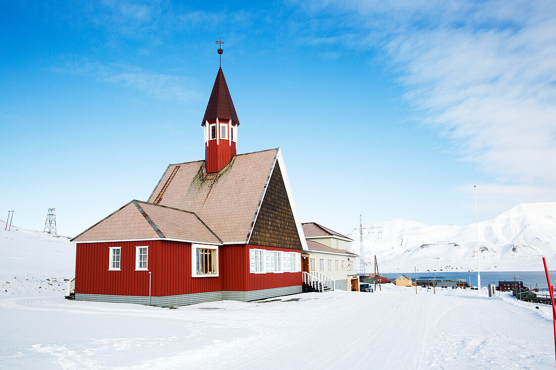 Falun red building in winter landscape
