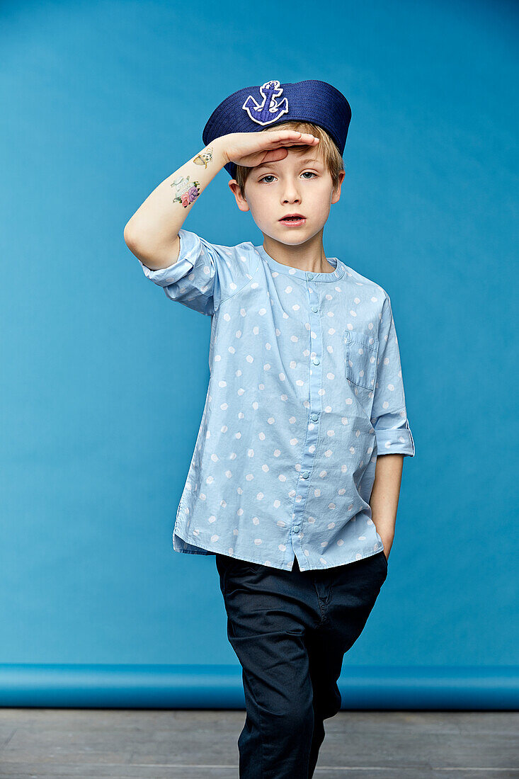 Boy wearing sailor hat