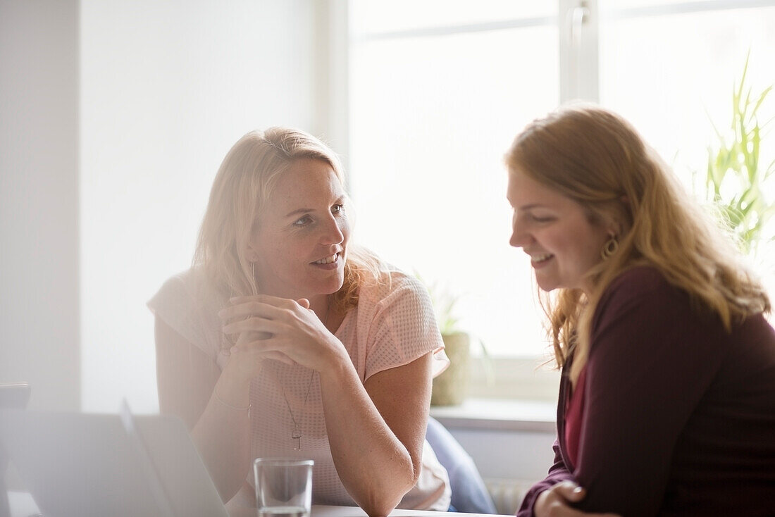 Two women having business meeting