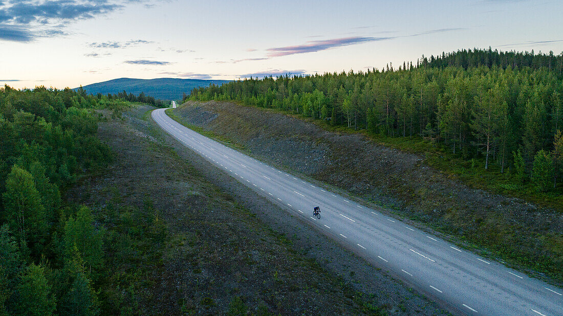 Cyclist on country road