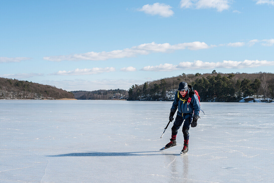 Senior man long-distance ice-skating