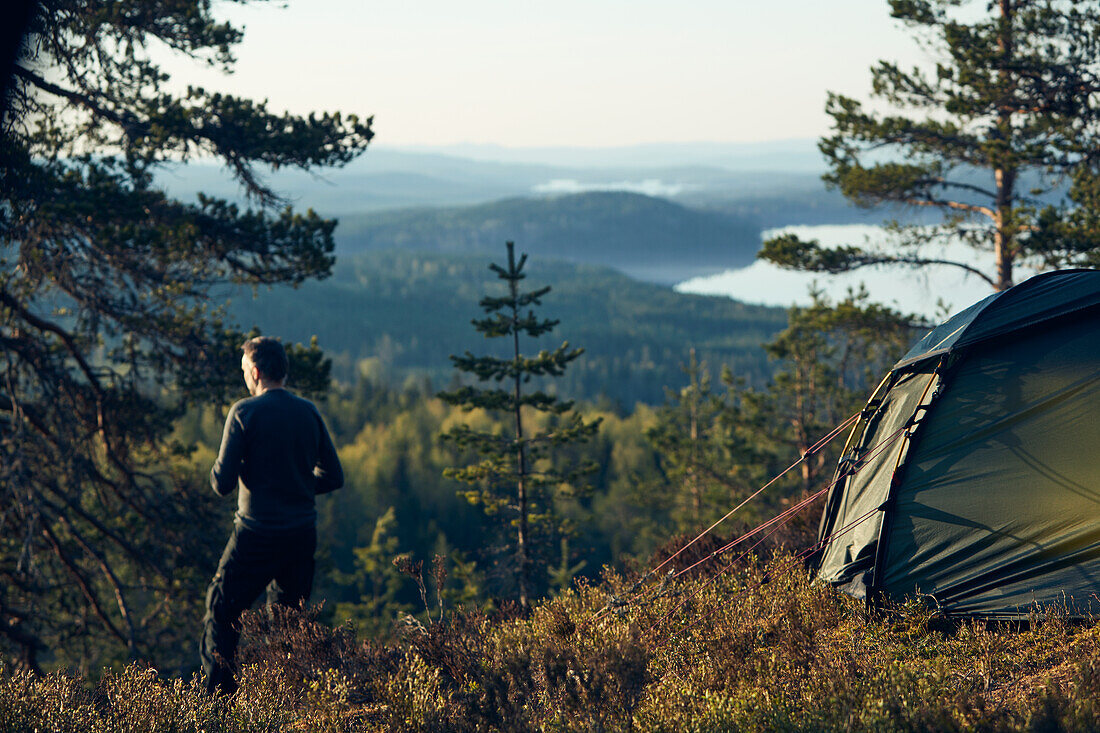 Man near tent