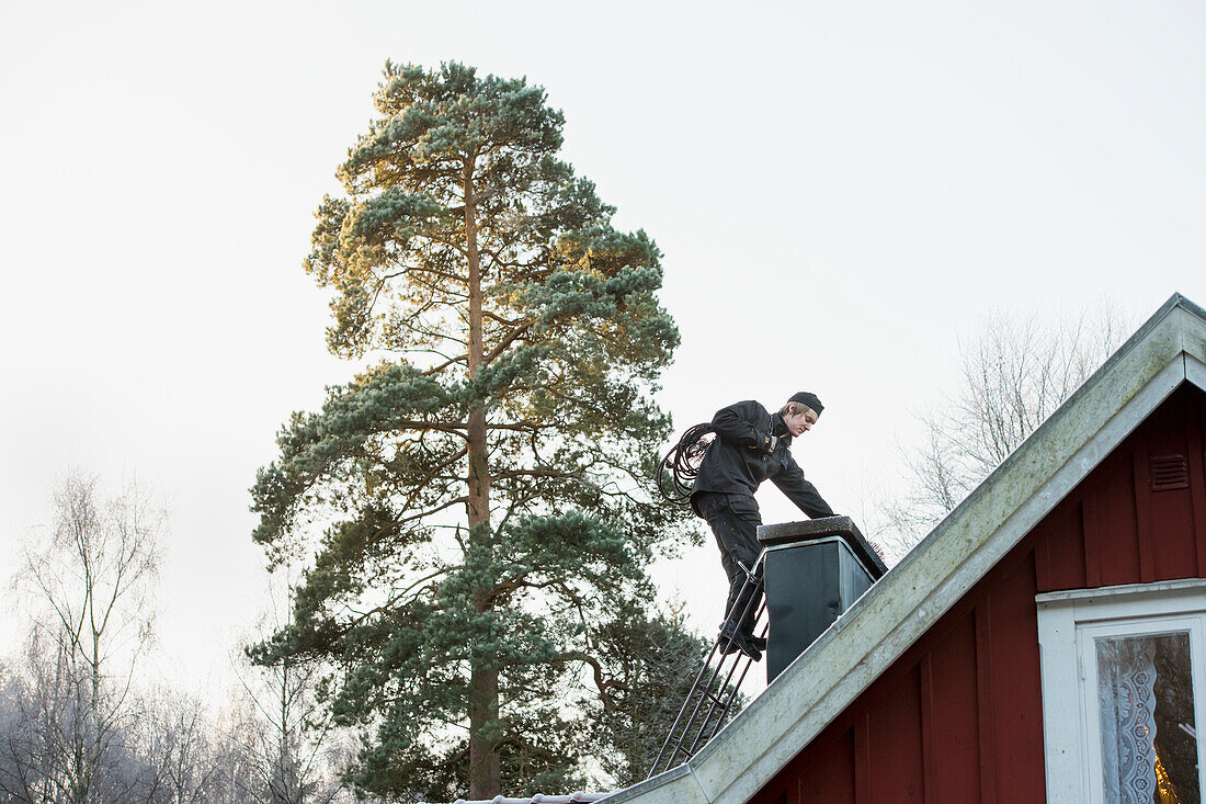 Chimney Sweep cleaning chimney