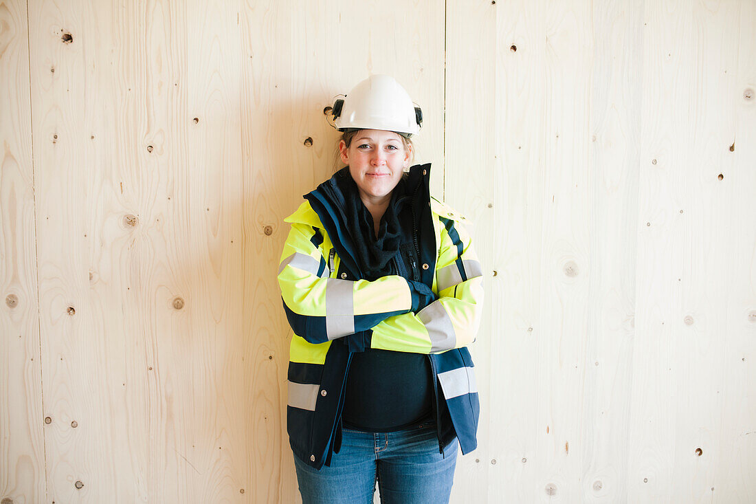 Female construction worker on building site