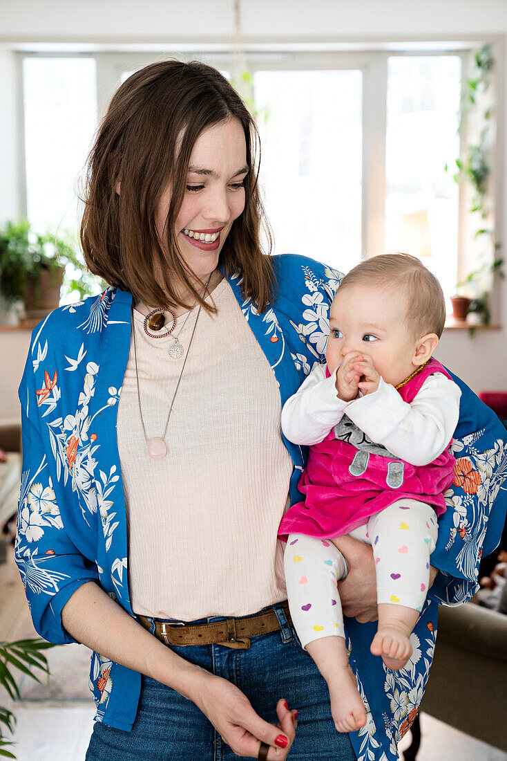 Mother with baby daughter