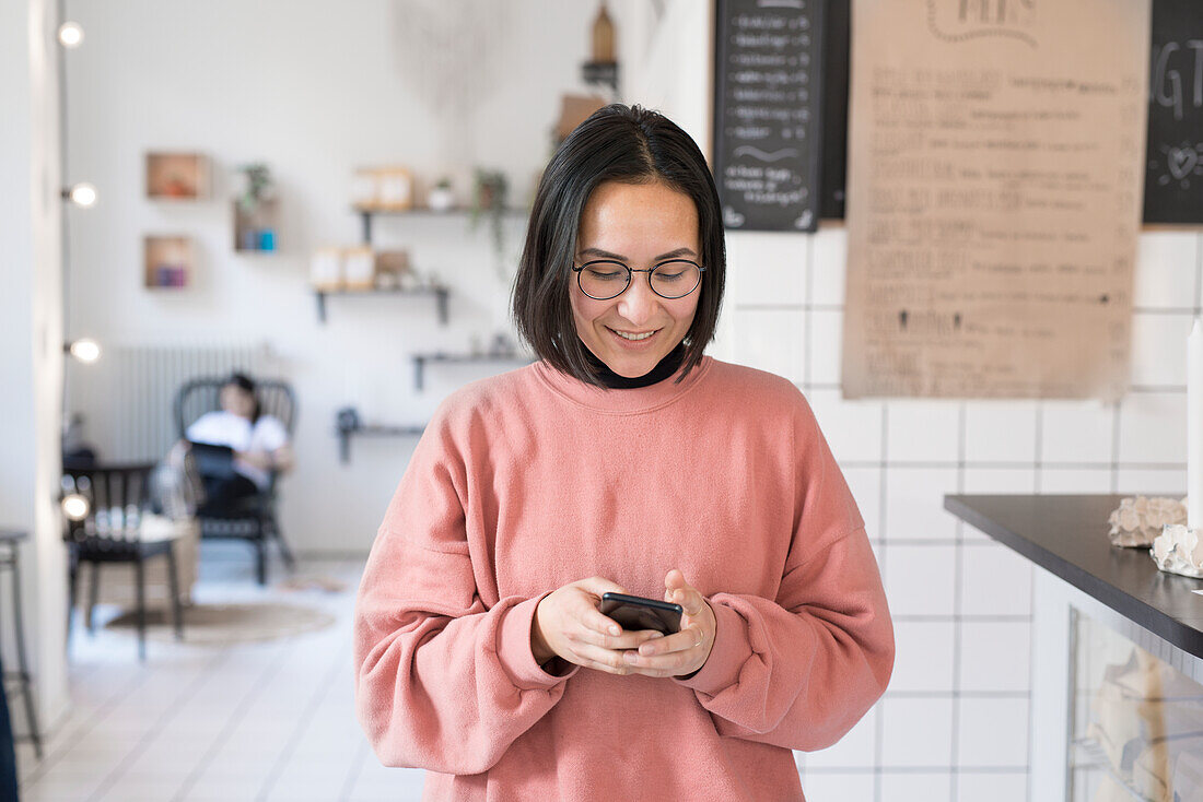 Woman using cell phone