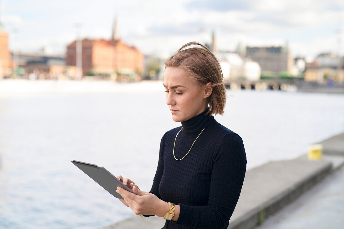 Woman using digital tablet