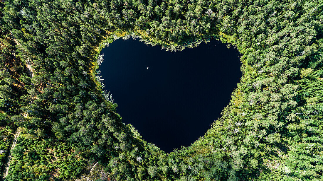 Aerial image of heart shaped lake