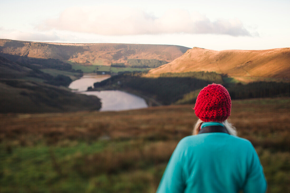 Woman looking at river