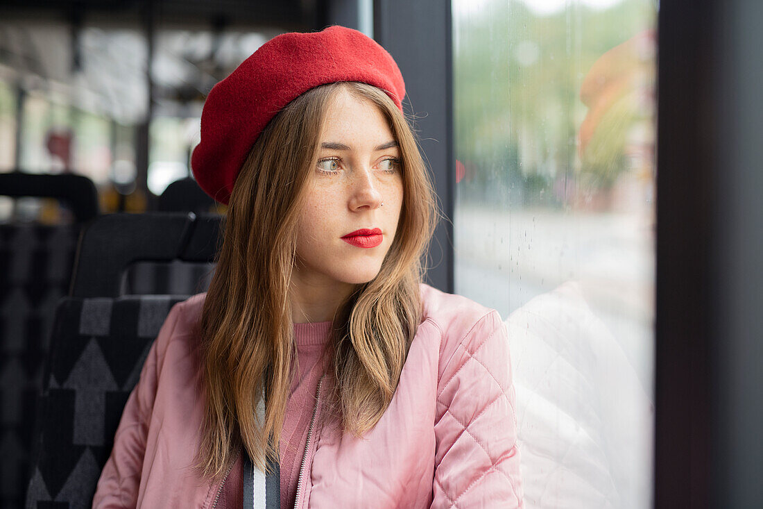 Young woman traveling on bus