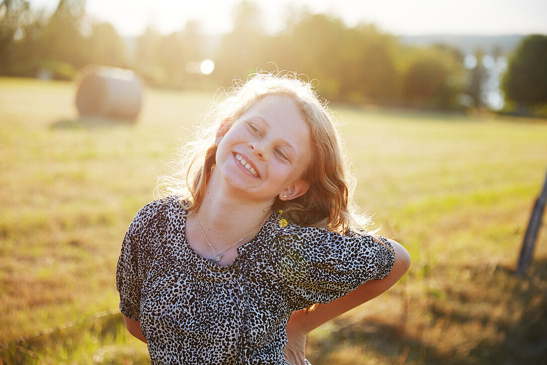 Smiling girl looking away