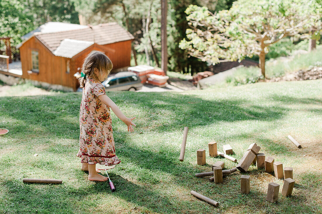 Girl playing molkky