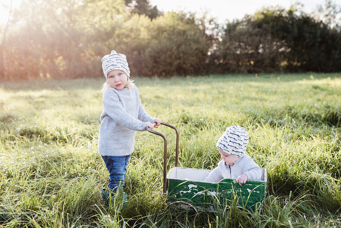 Girls playing on meadow