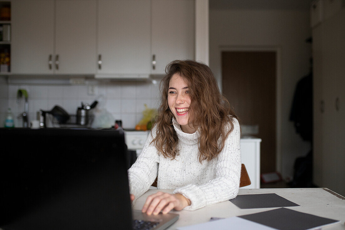 Young woman using laptop