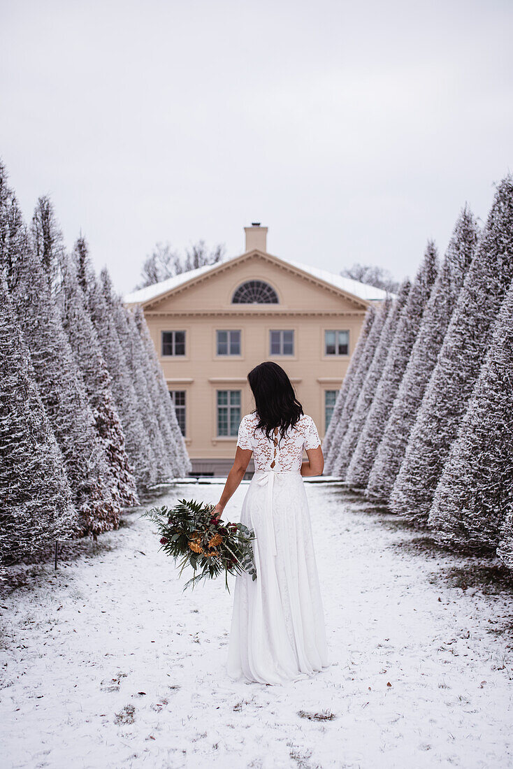 Bride in winter garden