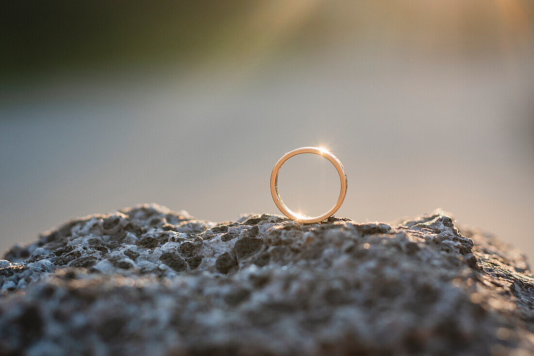 Wedding ring on rock