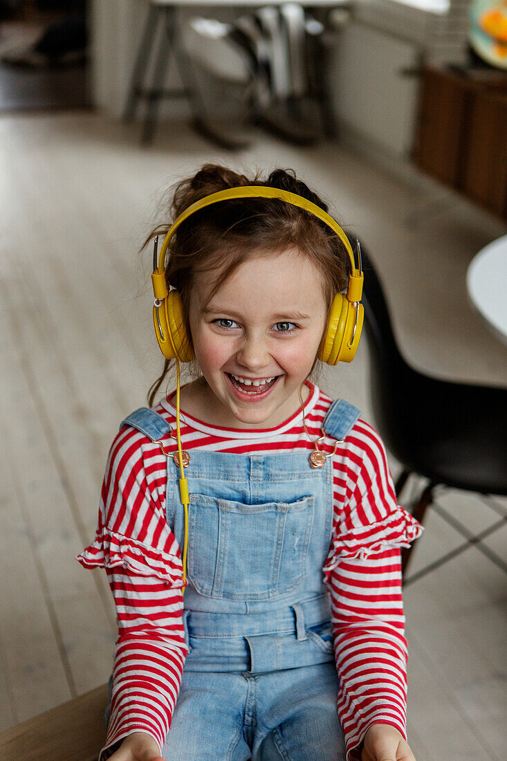 Happy girl wearing headphones