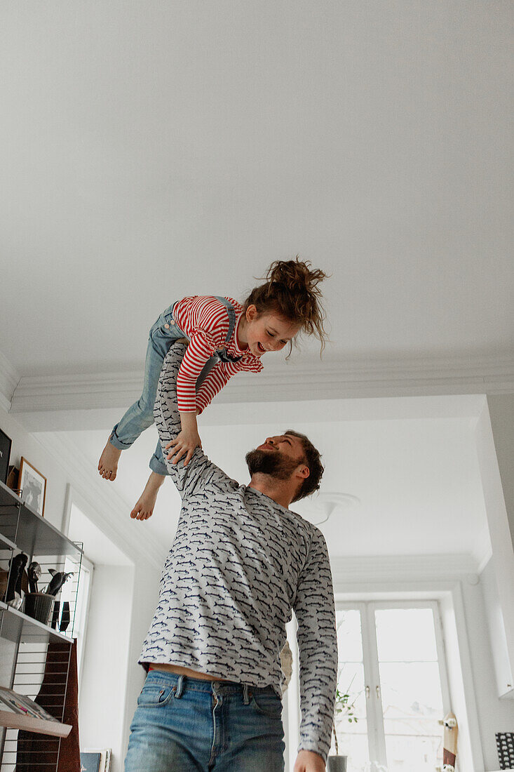 Father and daughter playing