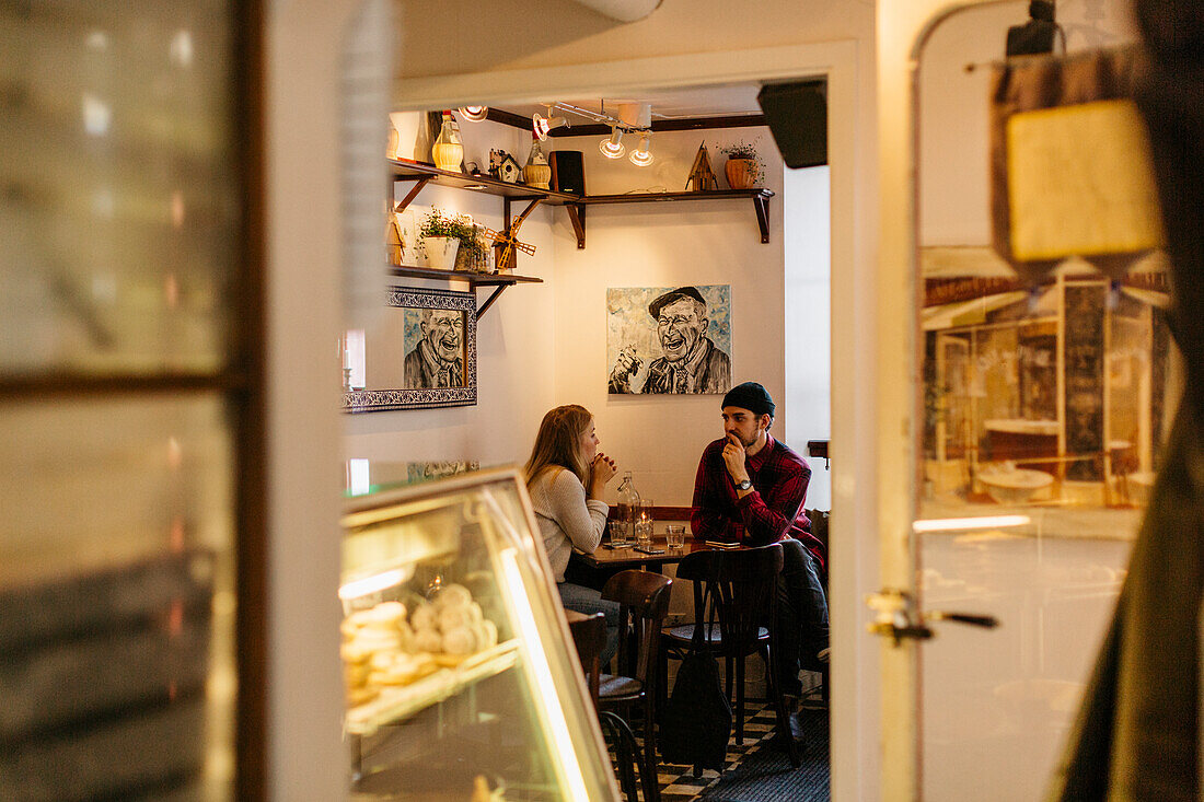 Couple sitting in cafe