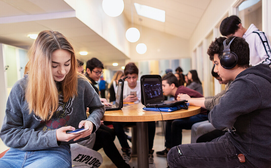 Teenage girl using phone