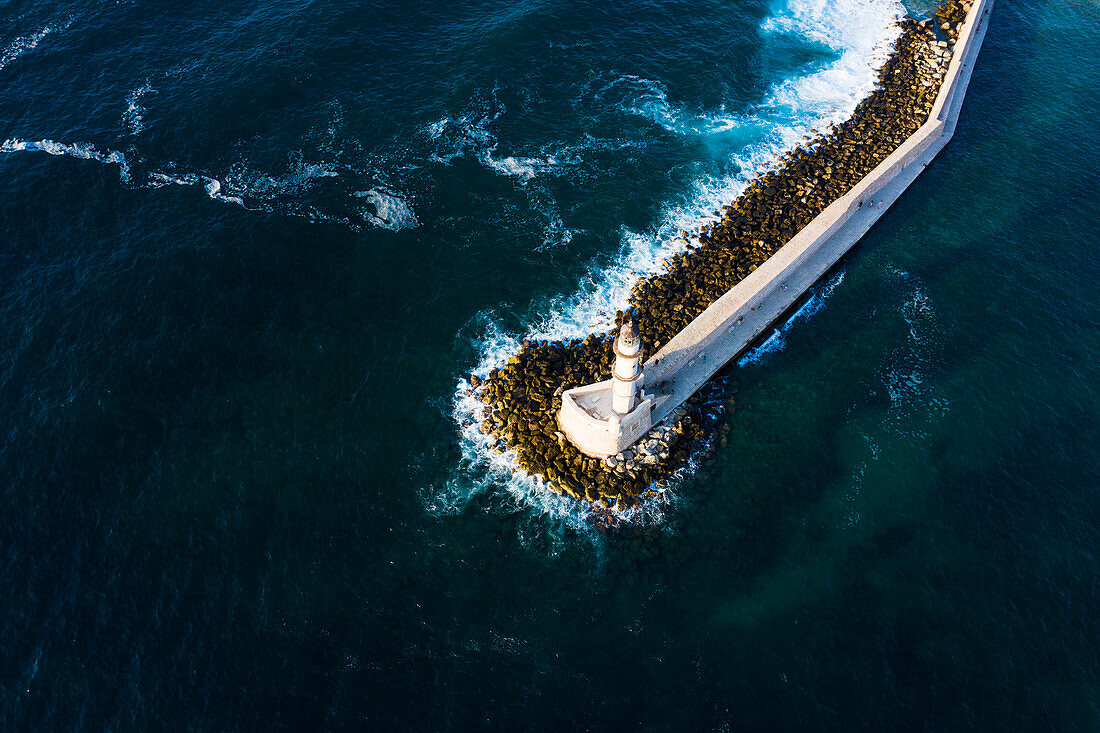 Aerial view of lighthouse and sea