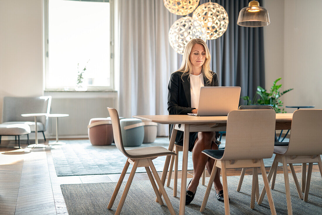 Woman using laptop