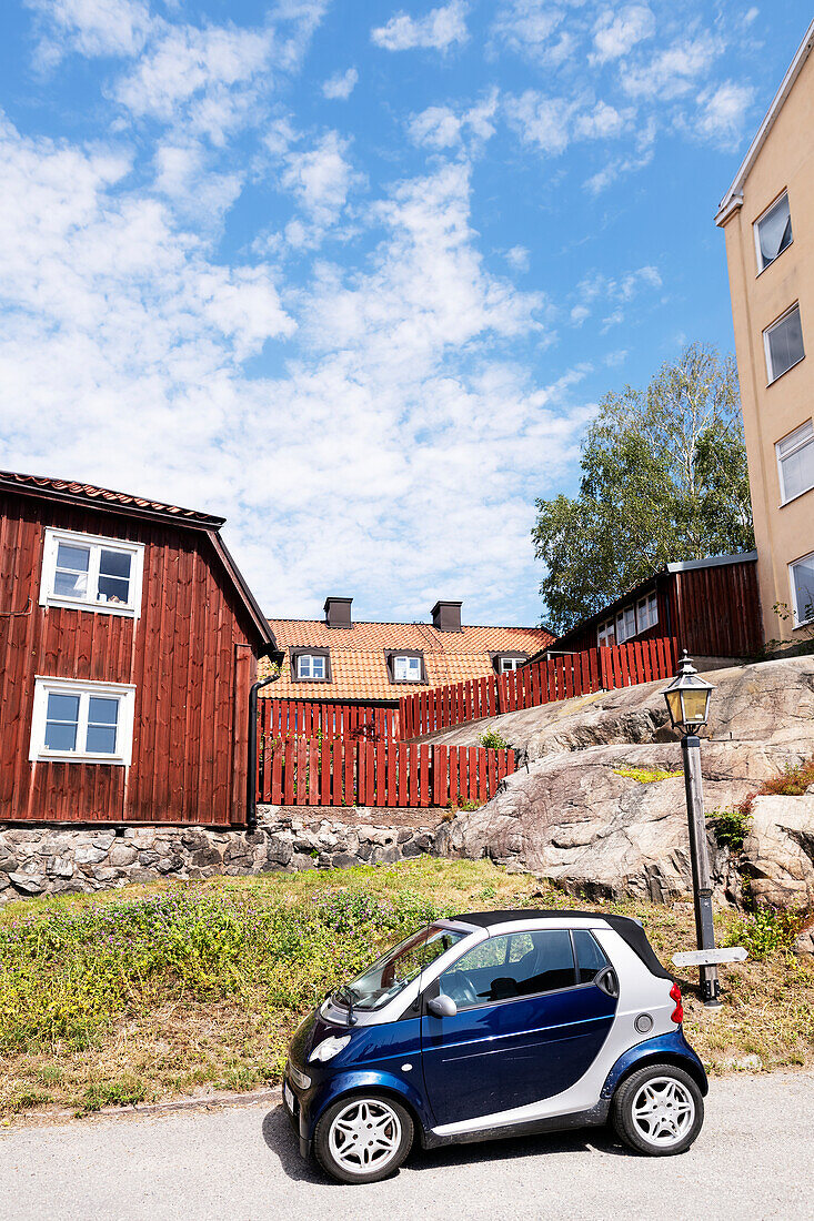 Car parked in front of houses