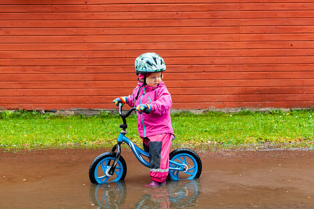 Girl on balance bike