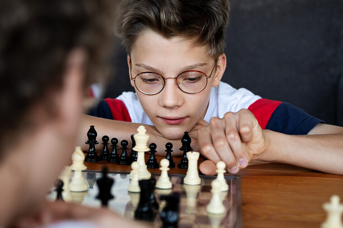 Boy playing chess