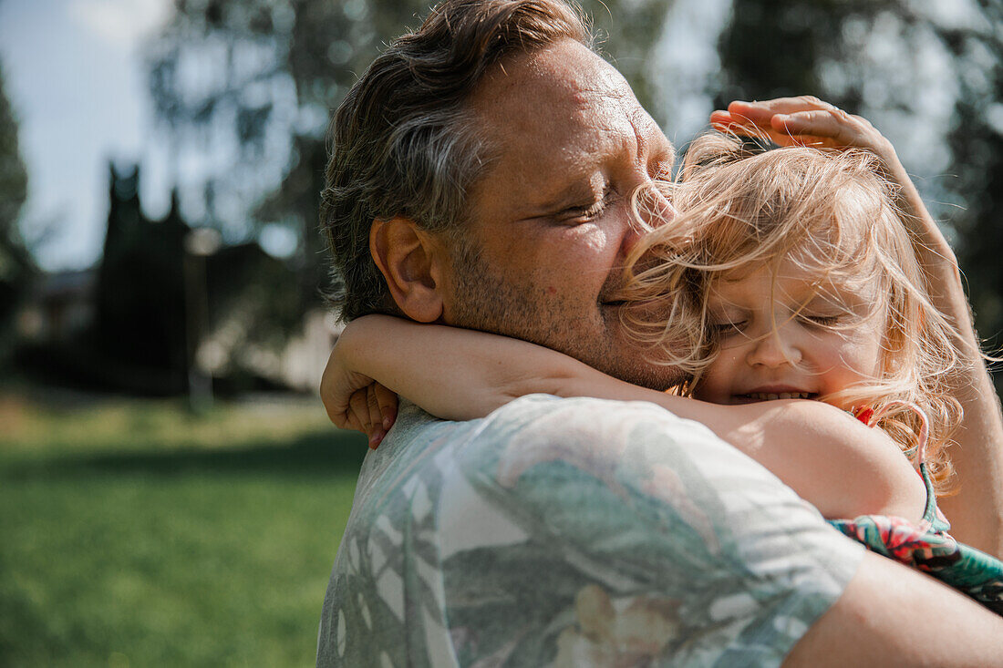 Father and daughter hugging