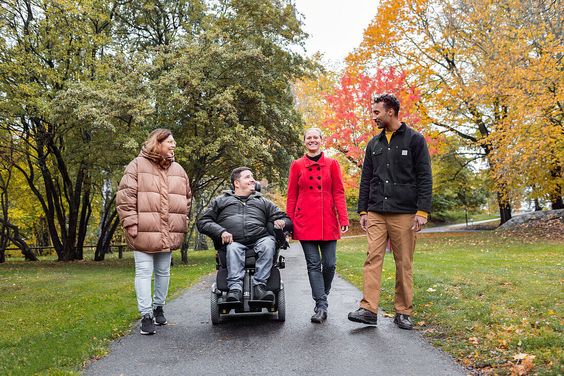 Family walking through park