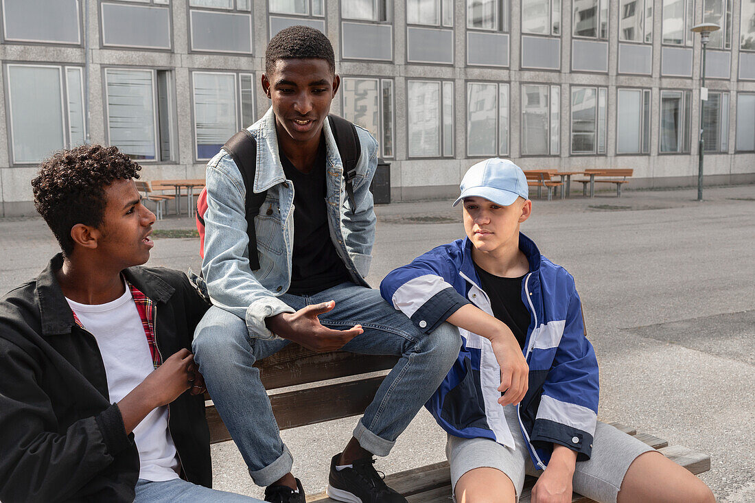 Friends sitting on bench