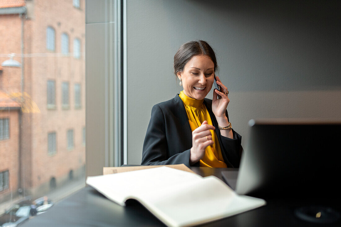 Businesswoman on the phone in office