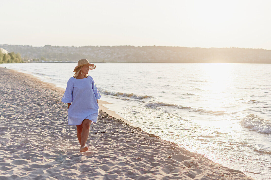 Woman walking on beach