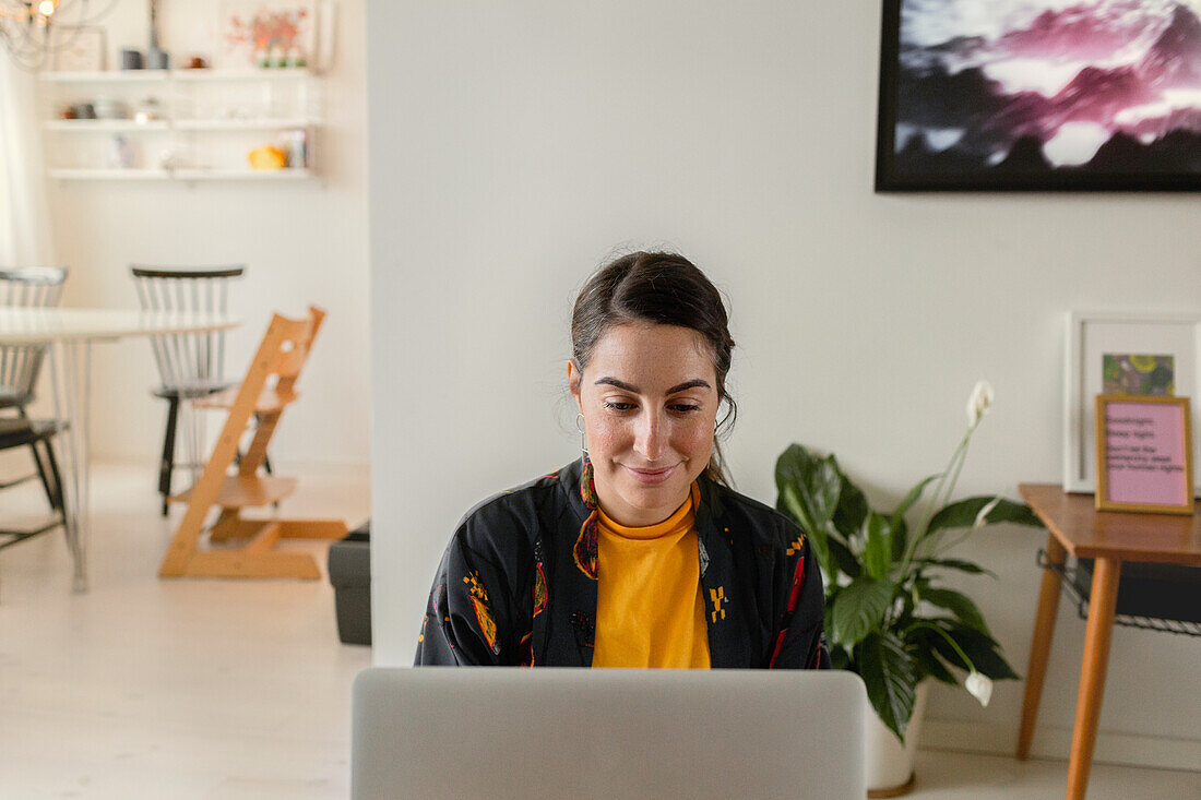 Woman using laptop