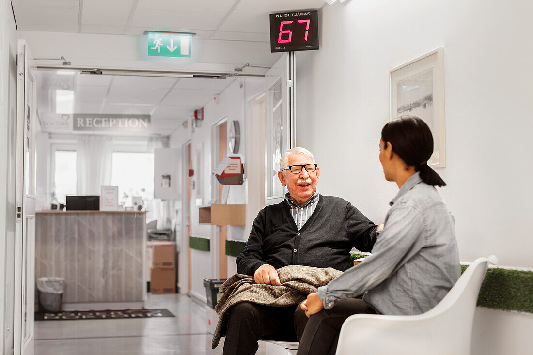 Patients sitting in surgery waiting room