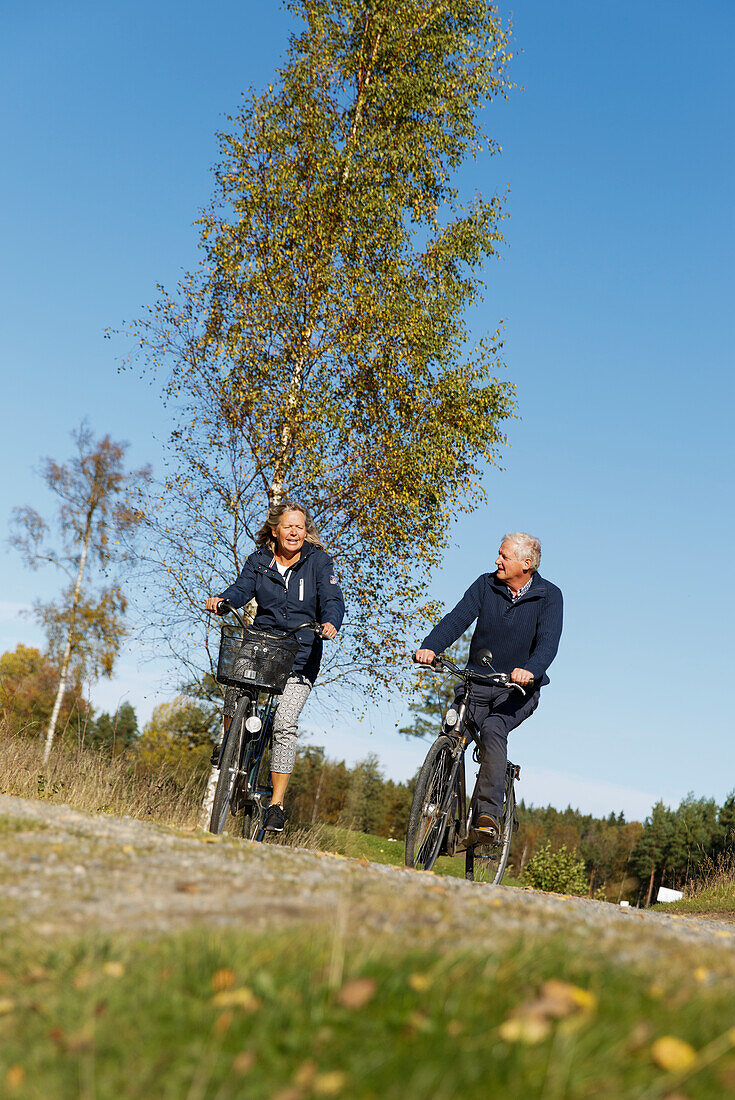 Senior couple cycling