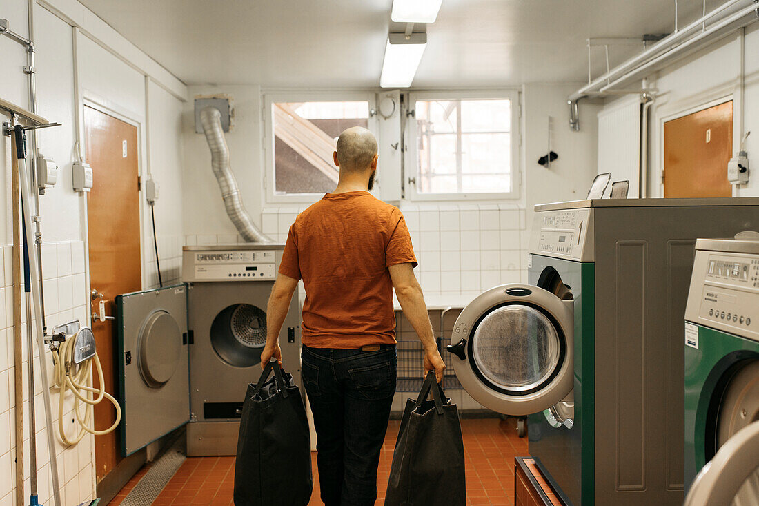 Man in utility room