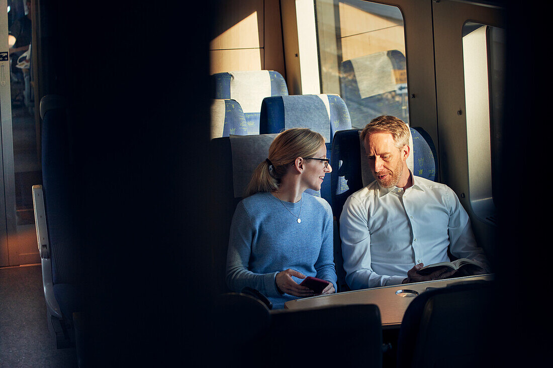 Couple in train carriage