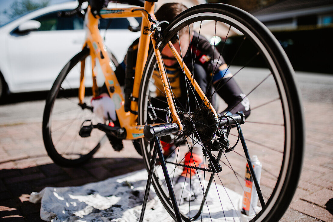 Man repairing bicycle